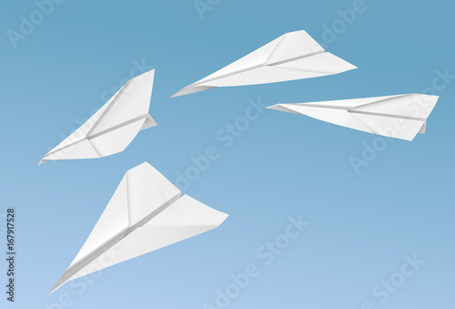 Vector realistic paper planes flying on the blue sky background