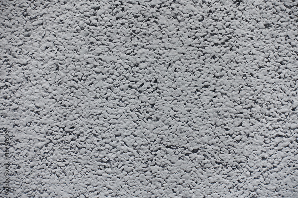 Macro of rough surface of light grey wall Macro of rough surface of light grey wall