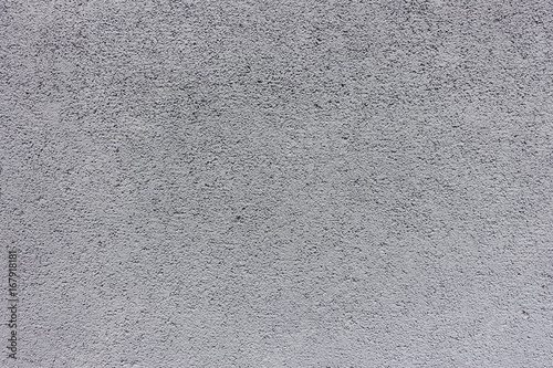 Light gray rough painted concrete wall texture