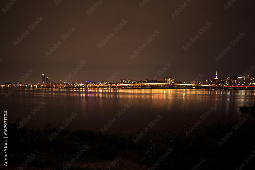  City lights of riverfront night view