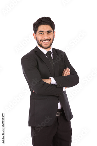 Happy handsome young businessman smiling and standing confidently, guy wearing black suit and black tie, isolated on white background