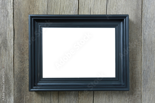 Modern Picture Frame on wooden wall.