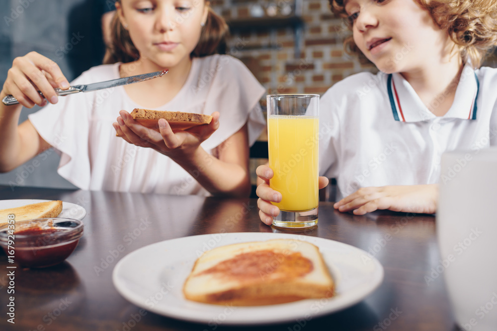 close-up shot of happy kids having breakfast before school close-up shot of happy kids having breakfast before school