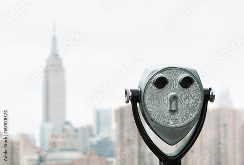 Binoculars and New York City Manhattan skyline