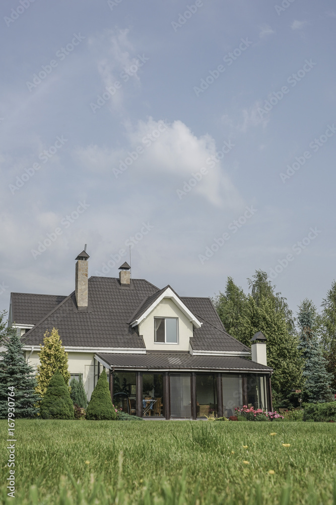 private house and its garden under beautiful sky private house and its garden under beautiful sky