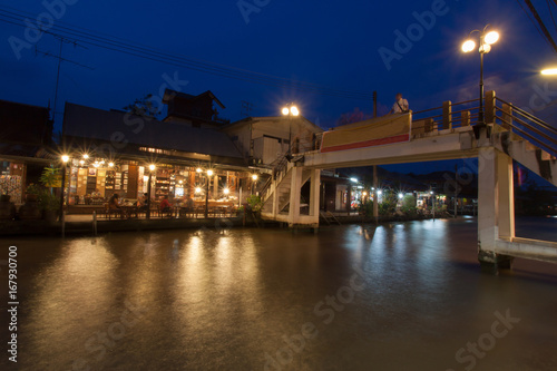 Floating market at night in Amphawa, Samut Songkhram , Thailand.