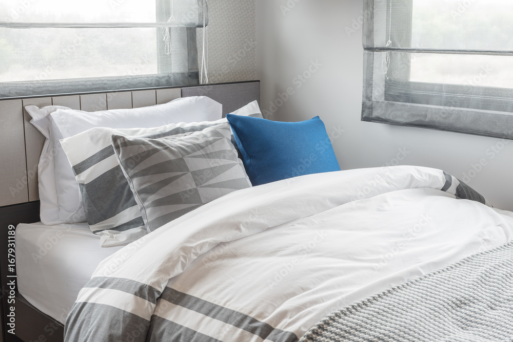 modern single bed with set of pillows in modern bedroom modern single bed with set of pillows in modern bedroom