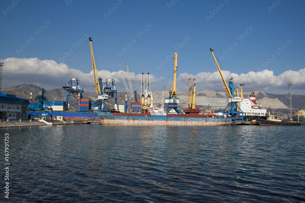 International sea port of Novorossiysk. Port cranes, ships and industrial objects