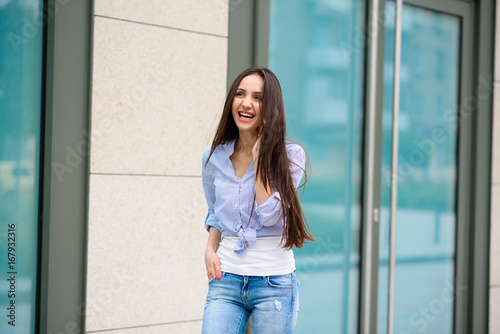 Pretty girl talking on the phone. © fotofrol