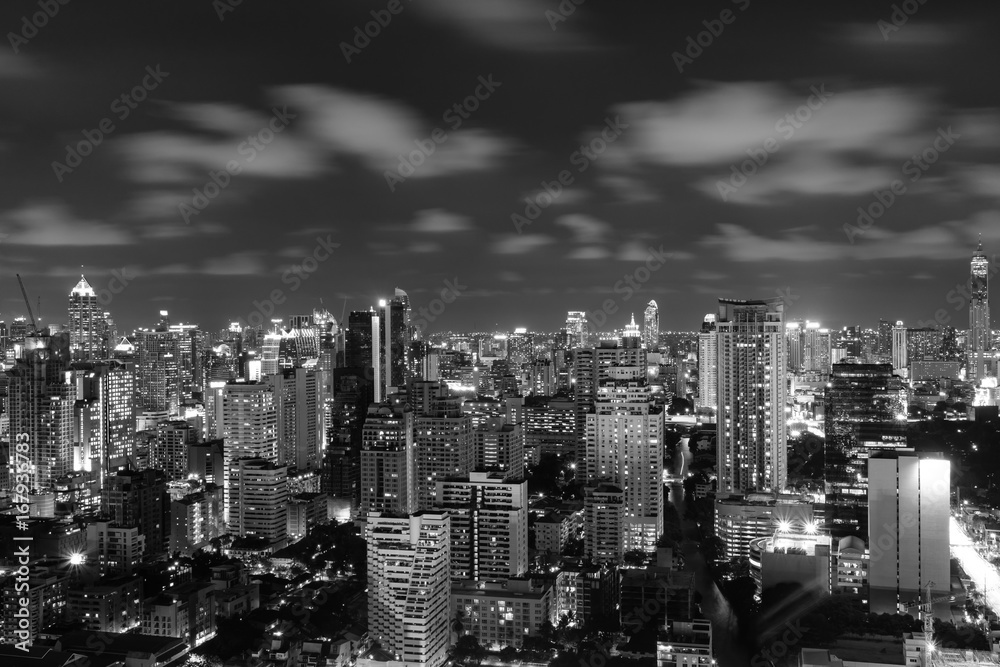 city skyline at night, cityscape background, long exposure technique for cloud movements
