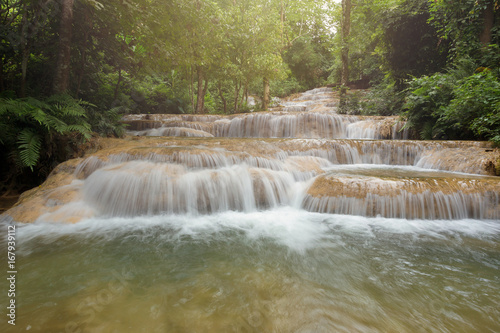 Fototapeta Naklejka Na Ścianę i Meble -  Deep forest waterfall National Park in Ngao District Lampang Thailand