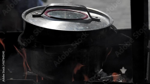 Cooking food in nature on the pot.