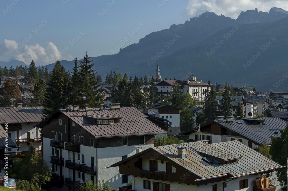 Autumnal corso Italia, the residential district in the town Cortina d'Ampezzo with mountain, Dolomite, Alps, Veneto, Italy, Europe Autumnal corso Italia, the residential district in the town Cortina d'Ampezzo with mountain, Dolomite, Alps, Veneto, Italy, Europe
