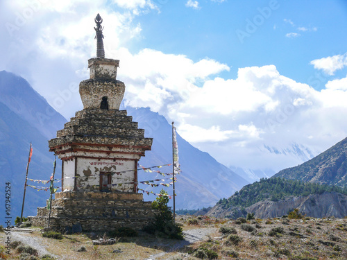 Lonely stupa under Annapurna mountain range, Nepal