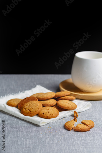 cookies and milk on gray cloth background
