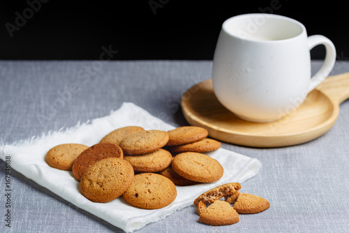 cookies and milk on gray cloth background