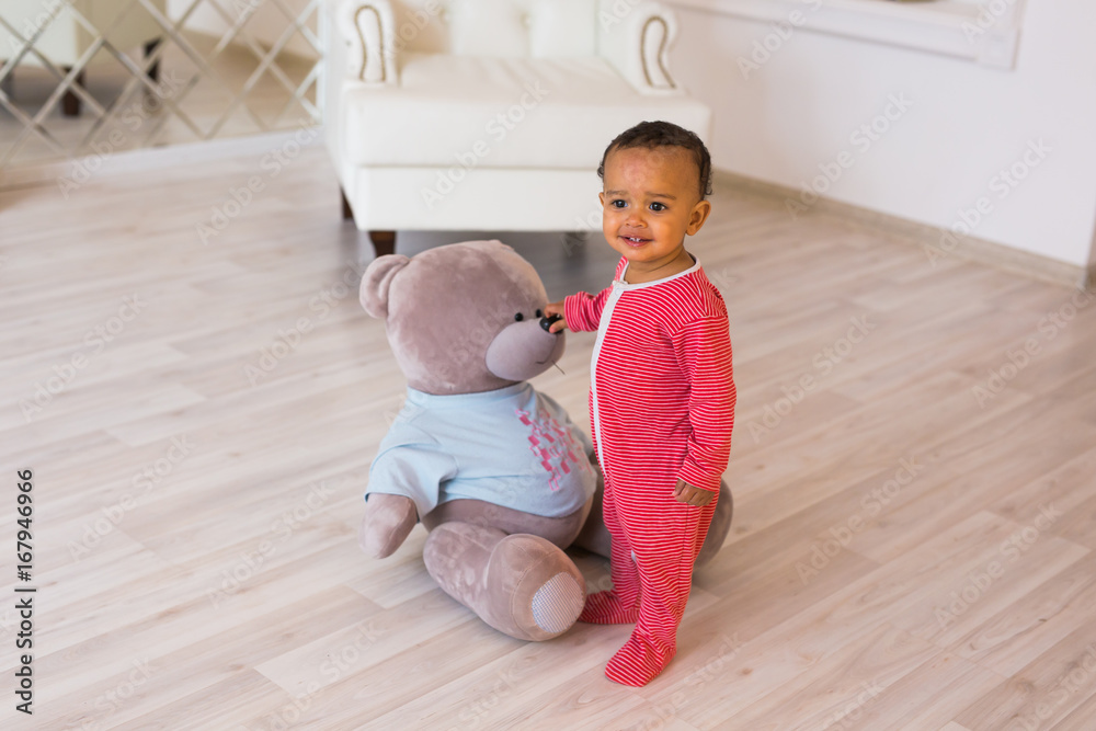 Cute little boy at home. Mixed race child. - obrazy, fototapety, plakaty 