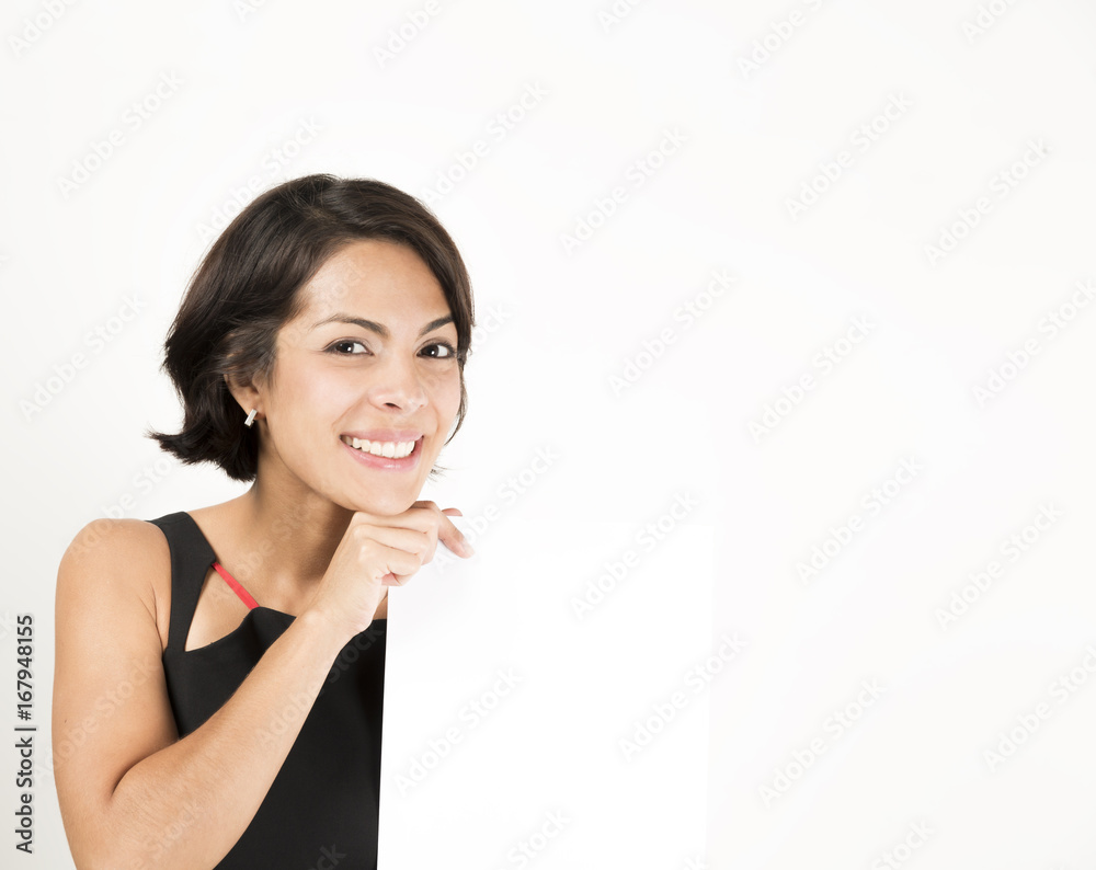 Beautiful young woman holding a blank sheet of paper Beautiful young woman holding a blank sheet of paper