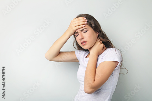 Young woman having headache