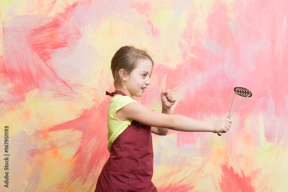 Fototapeta premium Small girl on colorful background.