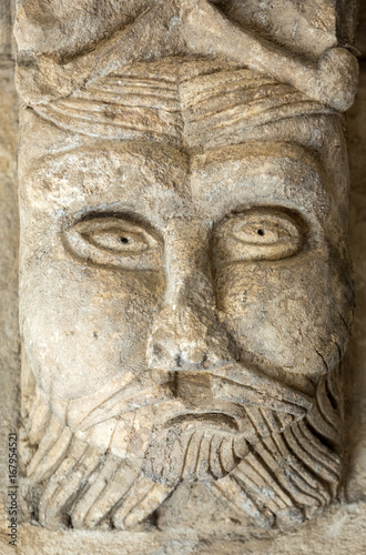  Romanesque Carving of a Strange Head or Face  c12th  Capital in Cloisters of Montmajour Abbey near Arles Provence France
