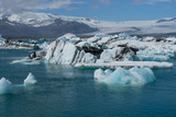 Iceland - Numerous ice floes before giant glacier mountains