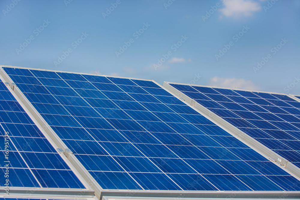 Solar panels on the sky background. Solar power plant. Blue solar panels. Alternative source of electricity. Solar panels on the sky background. Solar power plant. Blue solar panels. Alternative source of electricity.