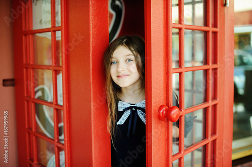 Kid girl in school uniform