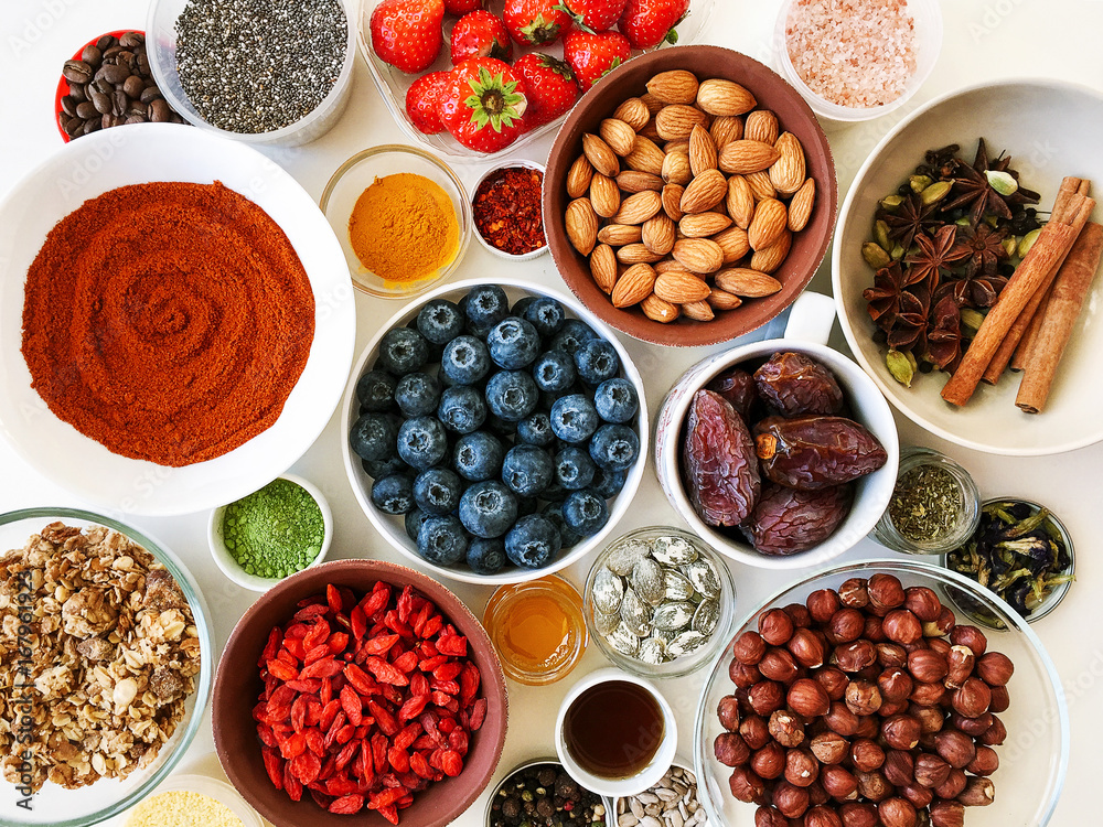 Lots of colorful berries, nuts, relish on the table Lots of colorful berries, nuts, relish on the table