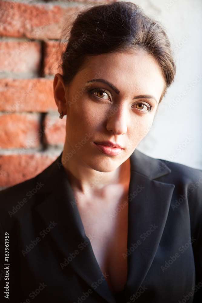 Portrait of a young woman in minimalistic inteior Portrait of a young woman in minimalistic inteior