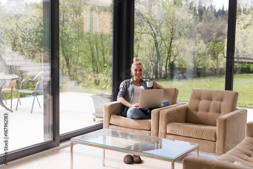 Wallpaper Mural woman drinking coffee enjoying relaxing lifestyle Torontodigital.ca