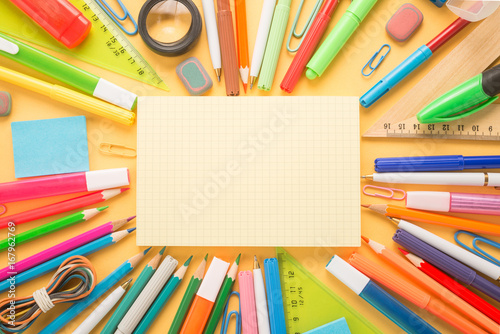 School office supplies on a yellow background 
