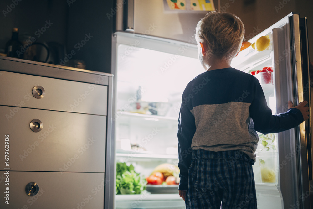 Boy Standing in Font of Open Fridge Stock Photo Adobe Stock