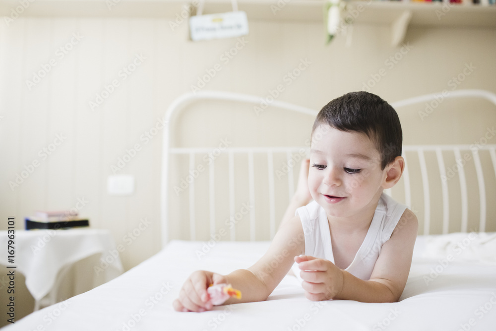Little boy playing with candy Little boy playing with candy