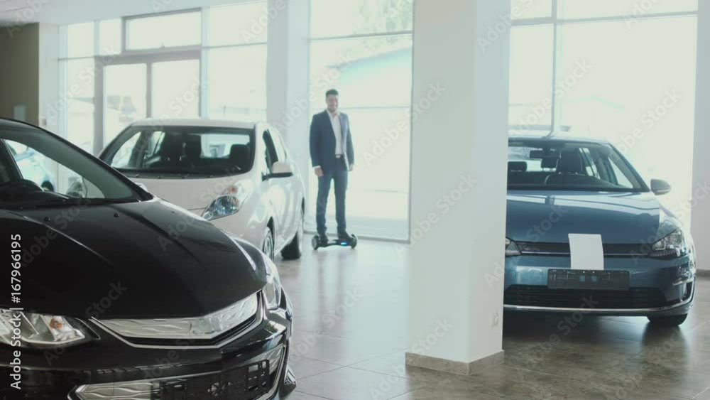 custom made wallpaper toronto digitalThe salesman on gyroscope shows a thumb up in the car dealership