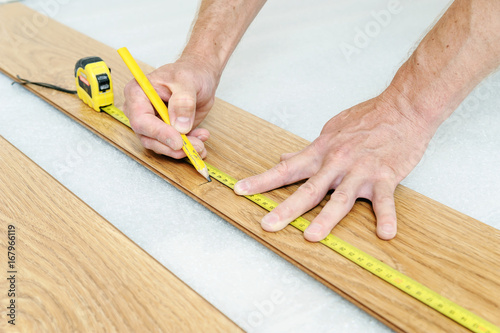 Installation of a laminate floorboard.