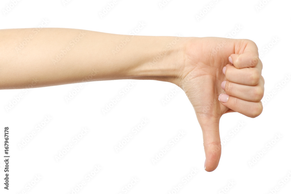 Woman's hand showing thumb down gesture Woman's hand showing thumb down gesture