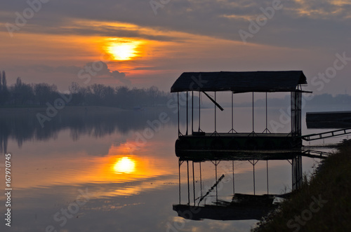 Fototapeta Naklejka Na Ścianę i Meble -  Sunset on a lake at Ada river island in Belgrade, Serbia