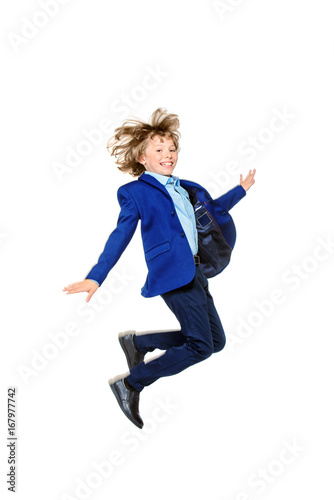 jumping boy in a suit