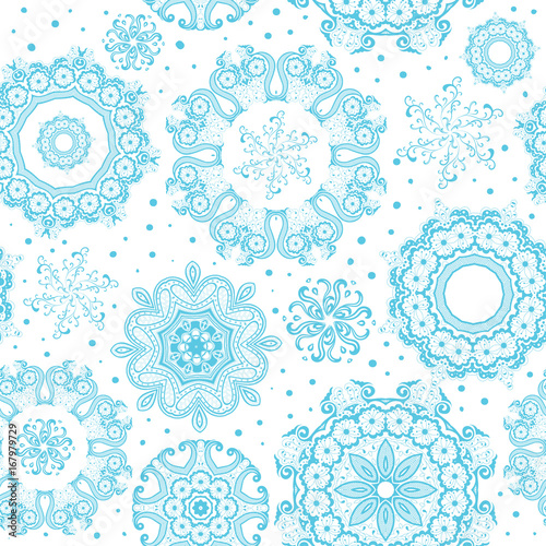 Seamless ornate blue snowflakes on white pattern. Background for Christmas and New year. Mandala lace snowflakes. Vector Illustration