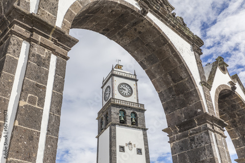  Entrance gates ( Portas da Cidade ) and the clock tower of Saint Sabastian church, Azores Portugal photo