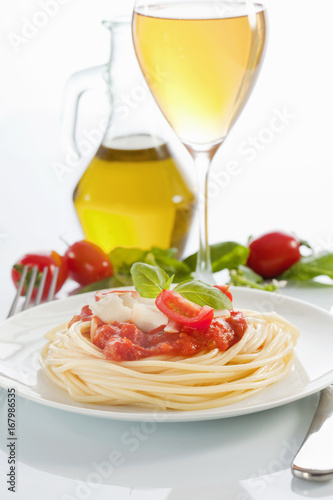 Spaghetti with tomato sauce and parmesan