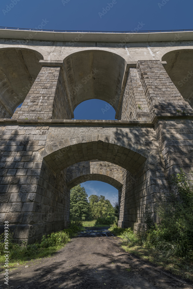 Stone rail viaduct near Sychrov village