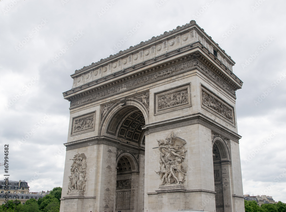 Paris, France - famous Triumphal Arch (Arc de Triomphe) located at the end of Champs-Elysees street.
