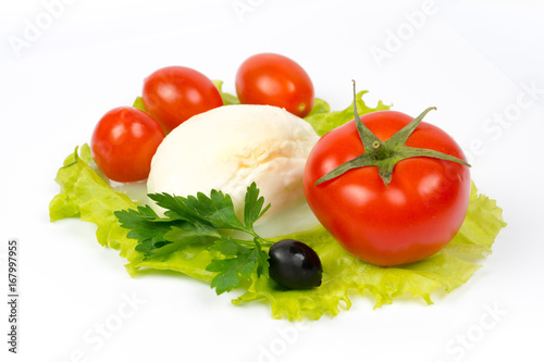 mozzarella tomatoes olive on salad leaf