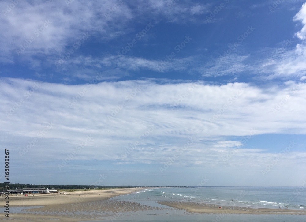 morning clouds over Ogunquit beach at low tide, Maine