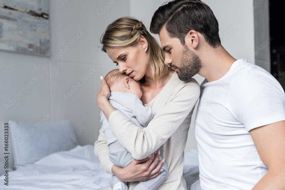 parents with cute baby