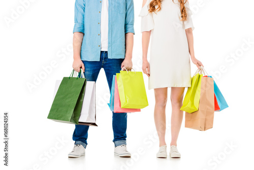 couple holding shopping bags