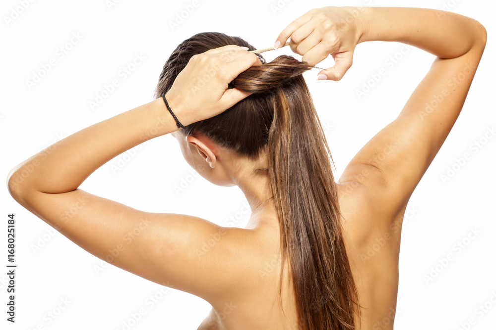 Young woman tied ponytail on white background Young woman tied ponytail on white background