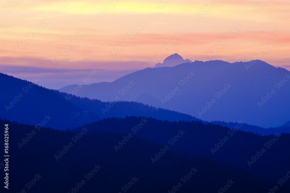 View of Triglav at sunset from Skofja Loka hills.